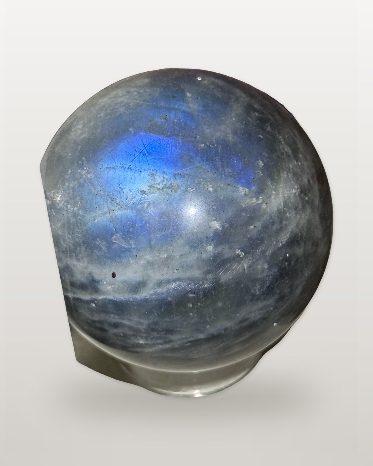 Black moonstone sphere with blue sheen